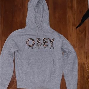 Grey Obey hoodie with floral lettering